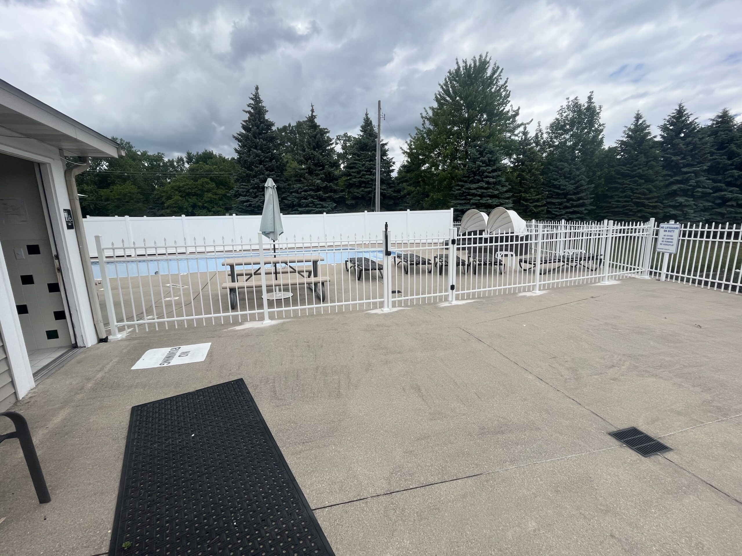 Commercial pool fence installation.
