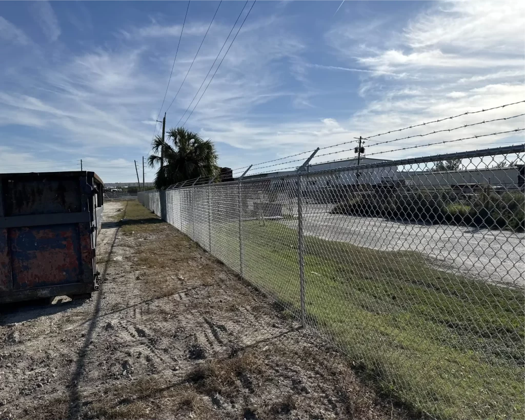 no climb chain link security fence install west michigan